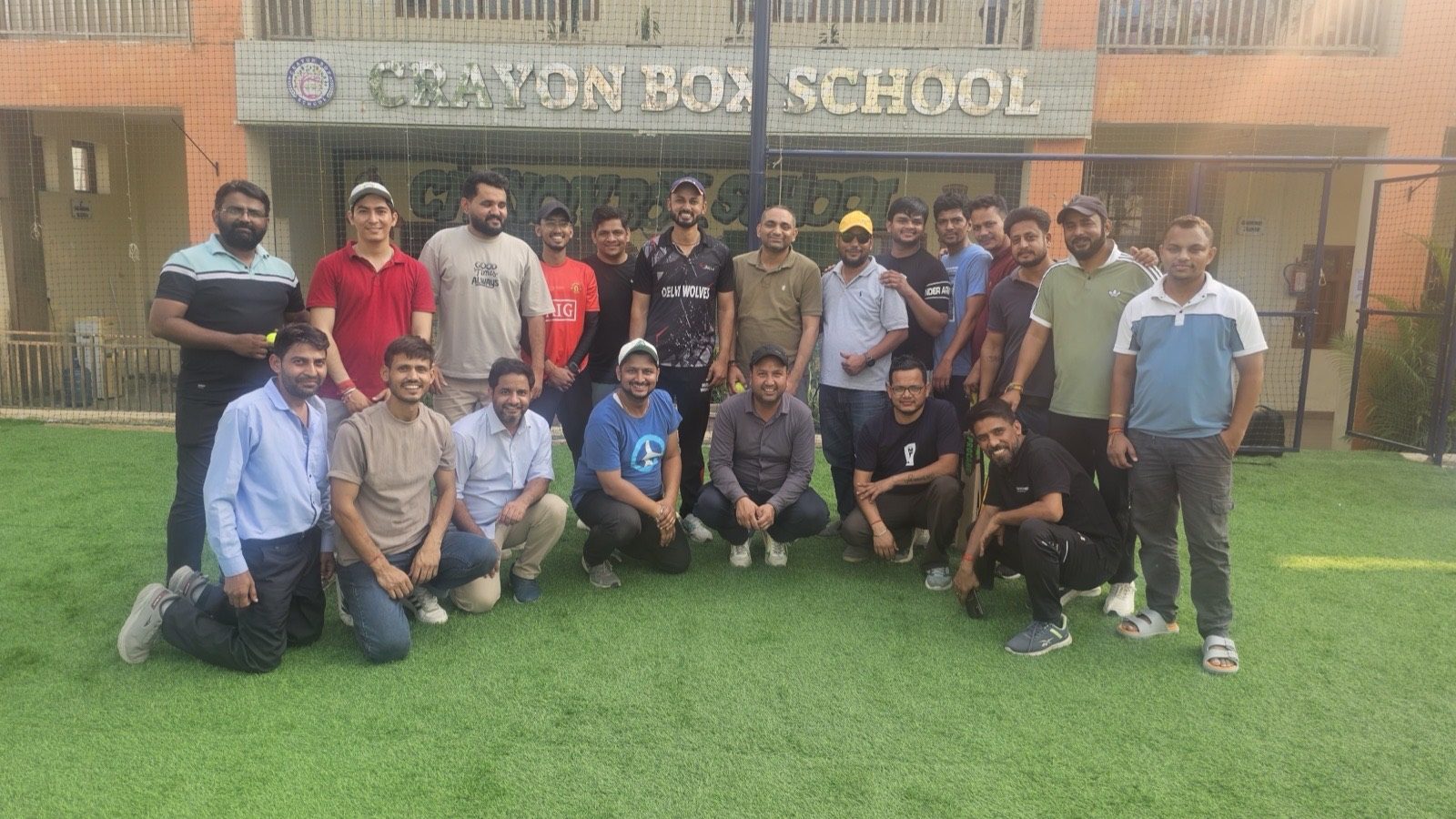 Parents, teachers and leadership cricket match on Crayon Box turf